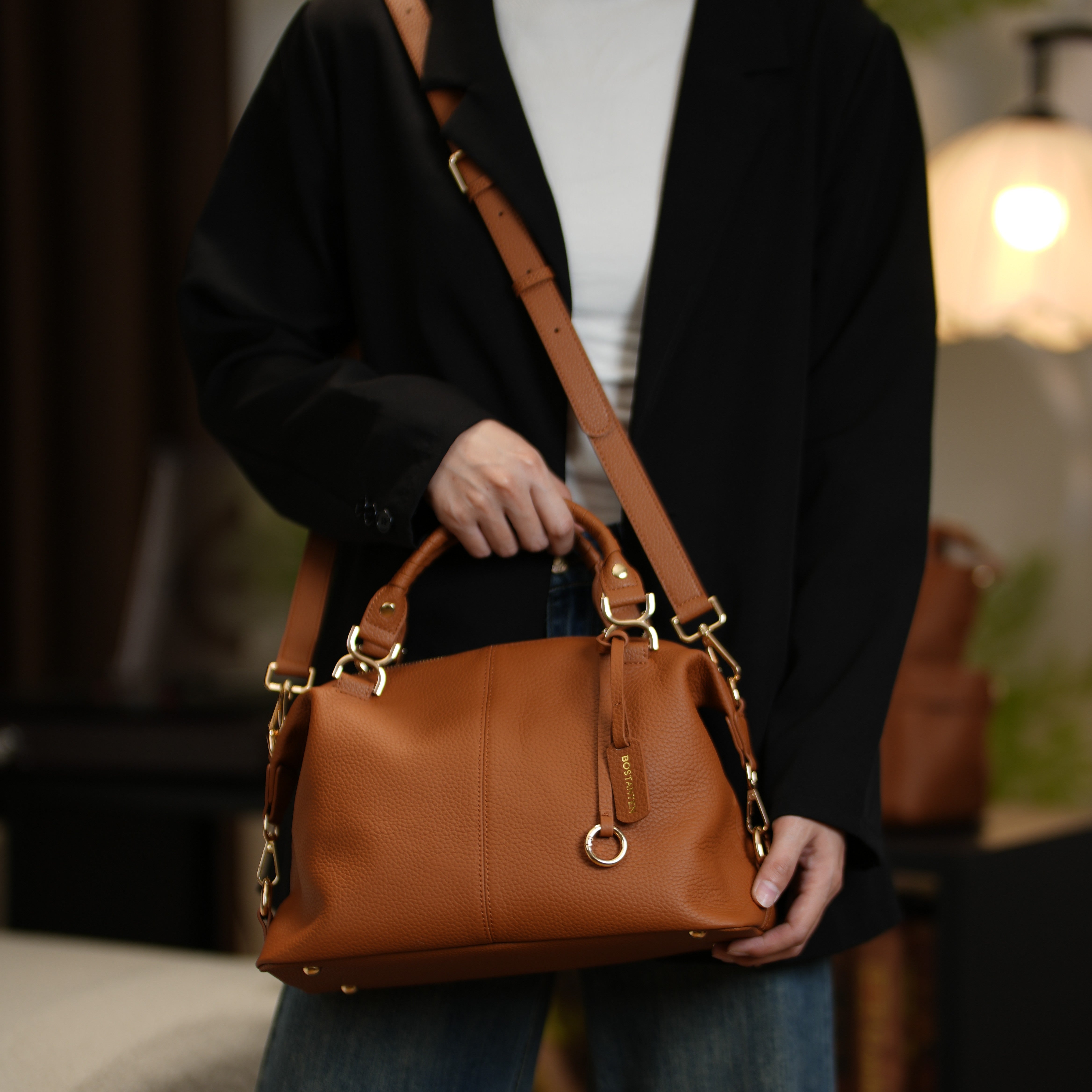 Nevin leather handbag worn crossbody
